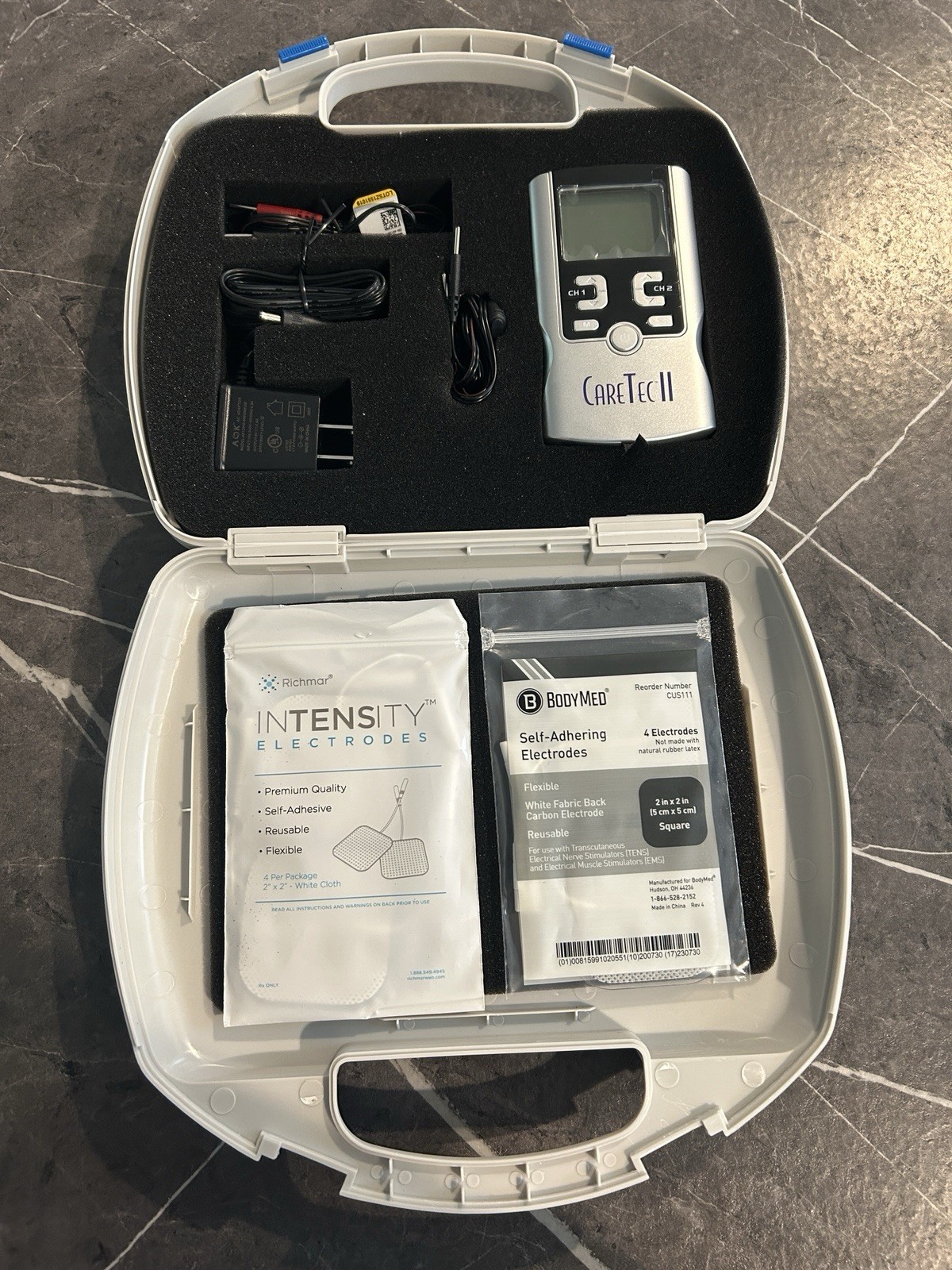 CareTec II TENS Unit 2-Channel Handheld Kit w/ Case Leads Electrodes Manual