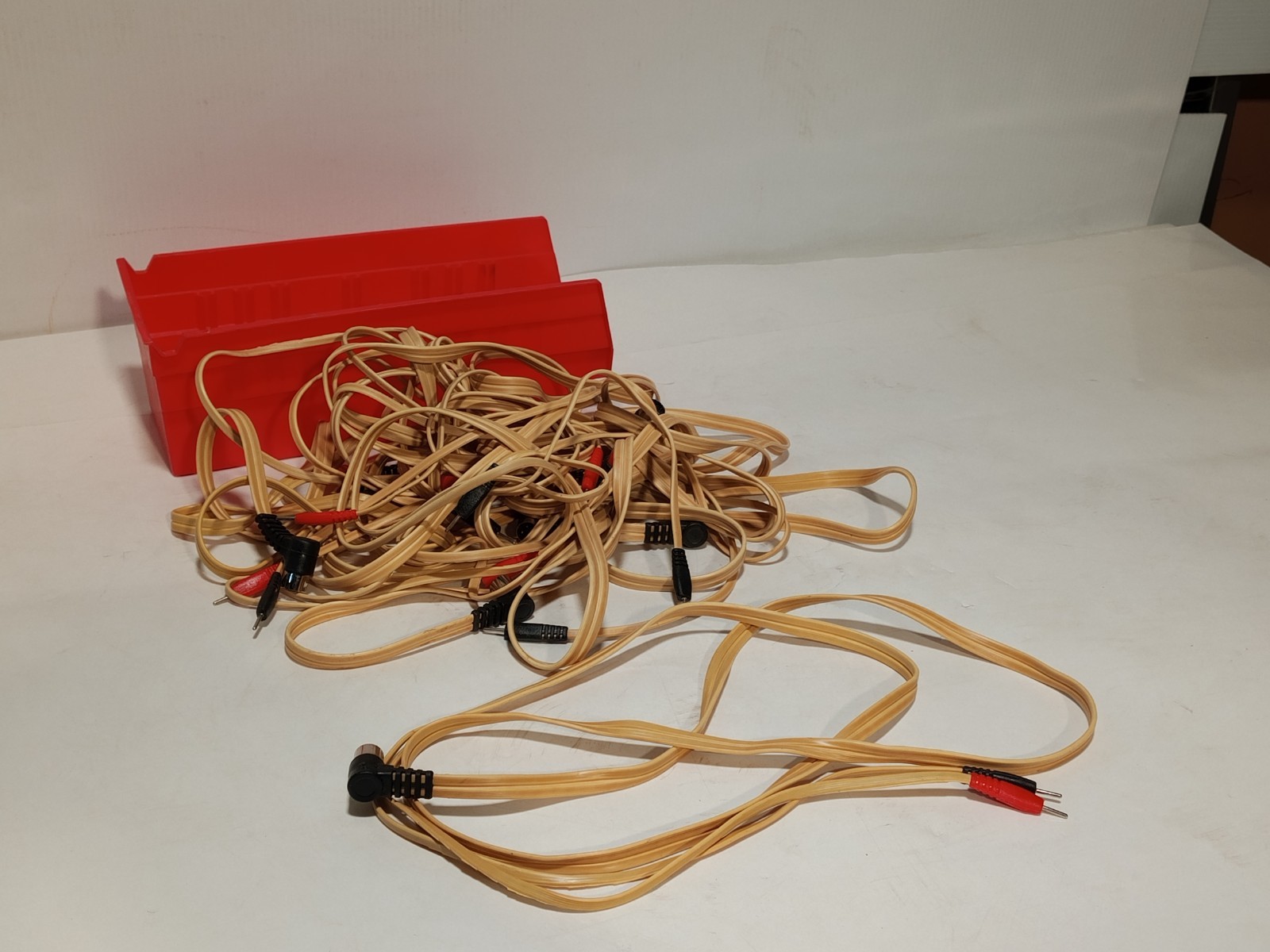 Unbranded assorted electrotherapy lead wires, tan cables, red & black connectors
