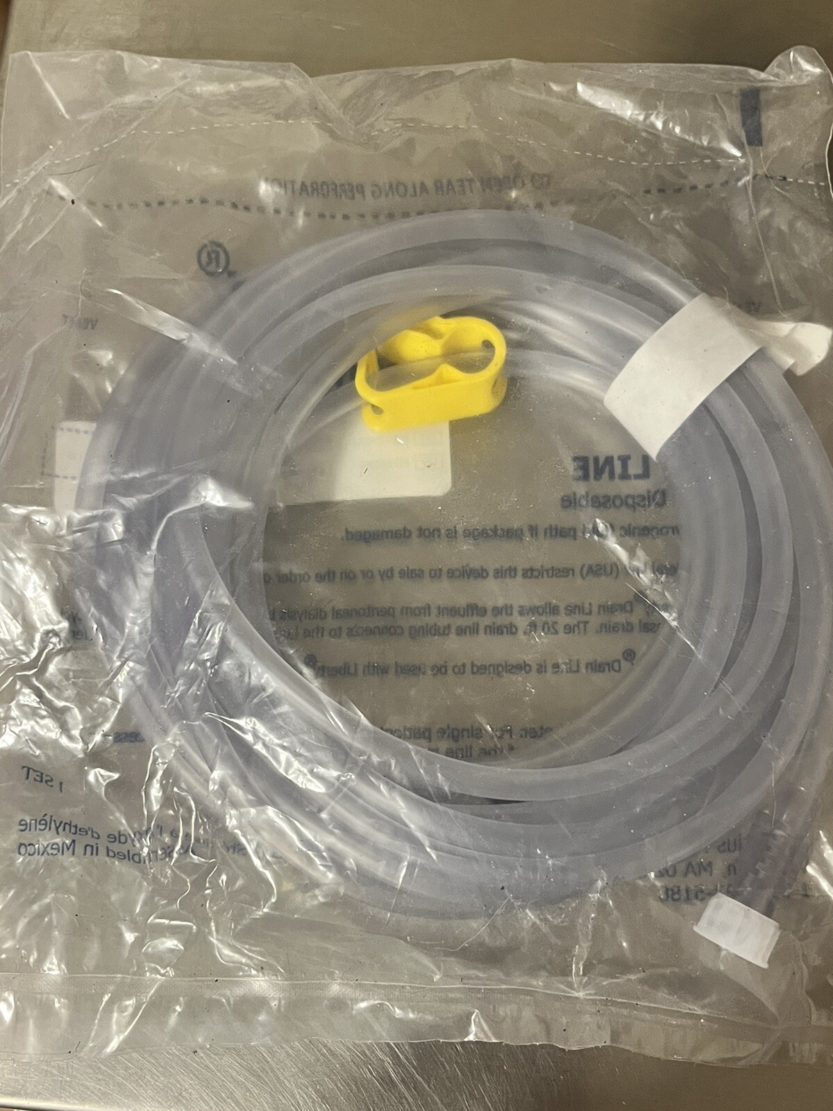 New in package LIBERTY UNITED DRAIN LINE WITH STAY SAFE SINGLE USE DISPOSABLE