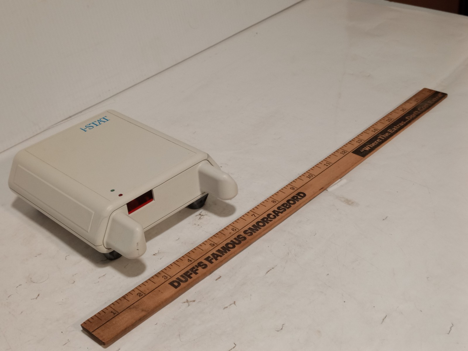 Abbott i-STAT 1 DS-300 Downloader-Serial base station, 12V, RS-232 DB9, as shown