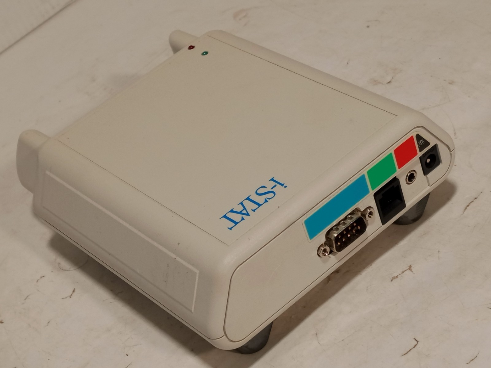 Abbott i-STAT 1 DS-300 Downloader-Serial base station, 12V, RS-232 DB9, as shown
