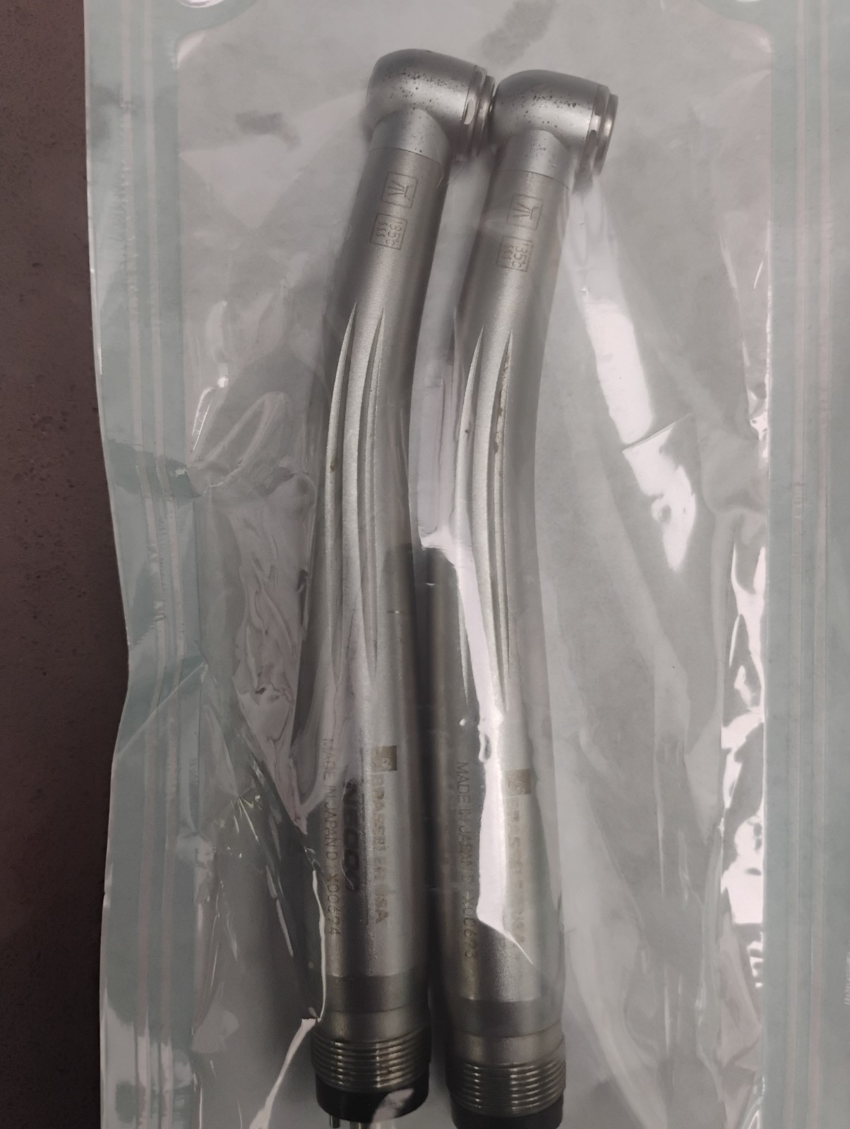 Used traditional push button handpiece