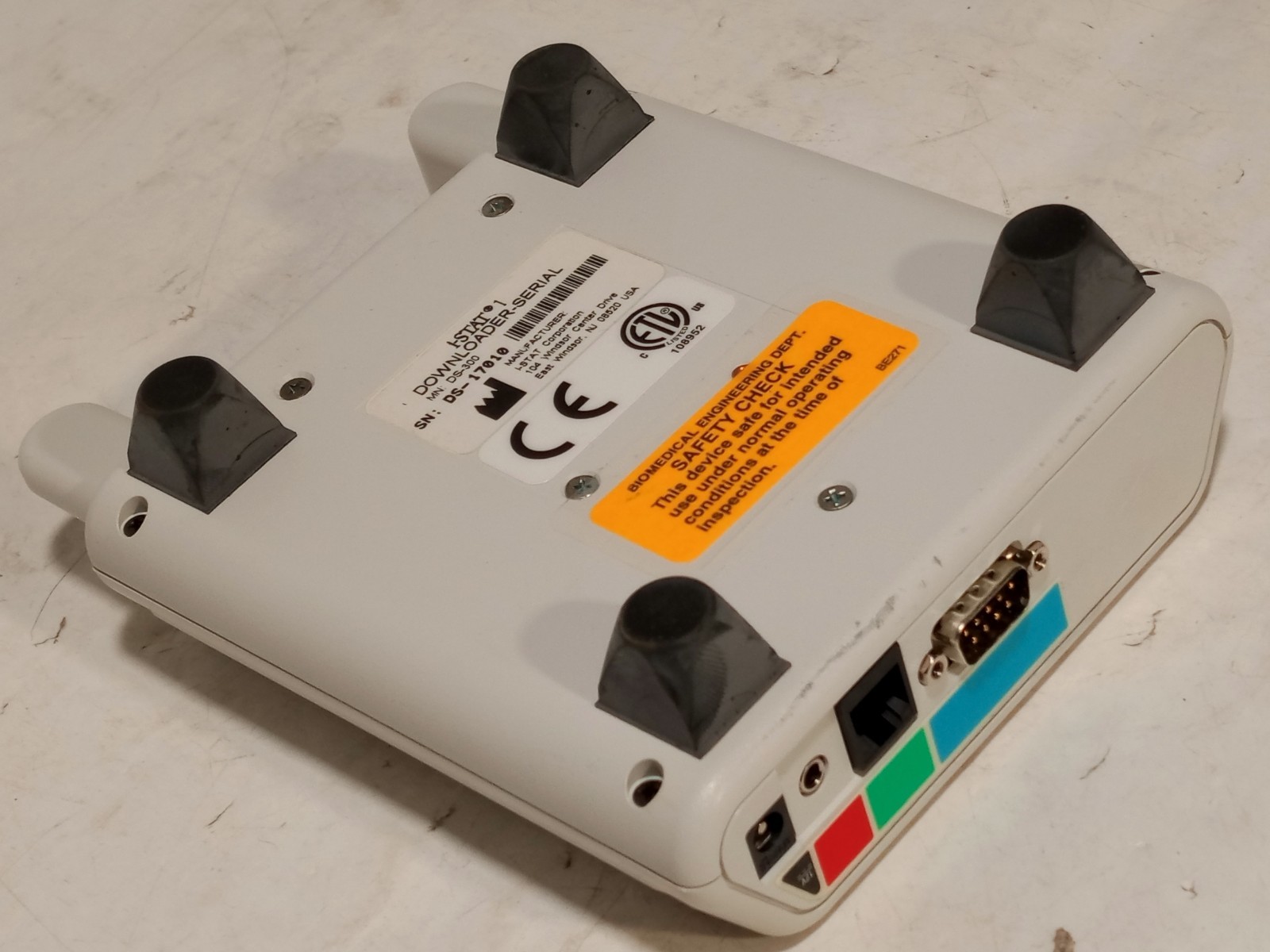 Abbott i-STAT 1 DS-300 Downloader-Serial base station, 12V, RS-232 DB9, as shown