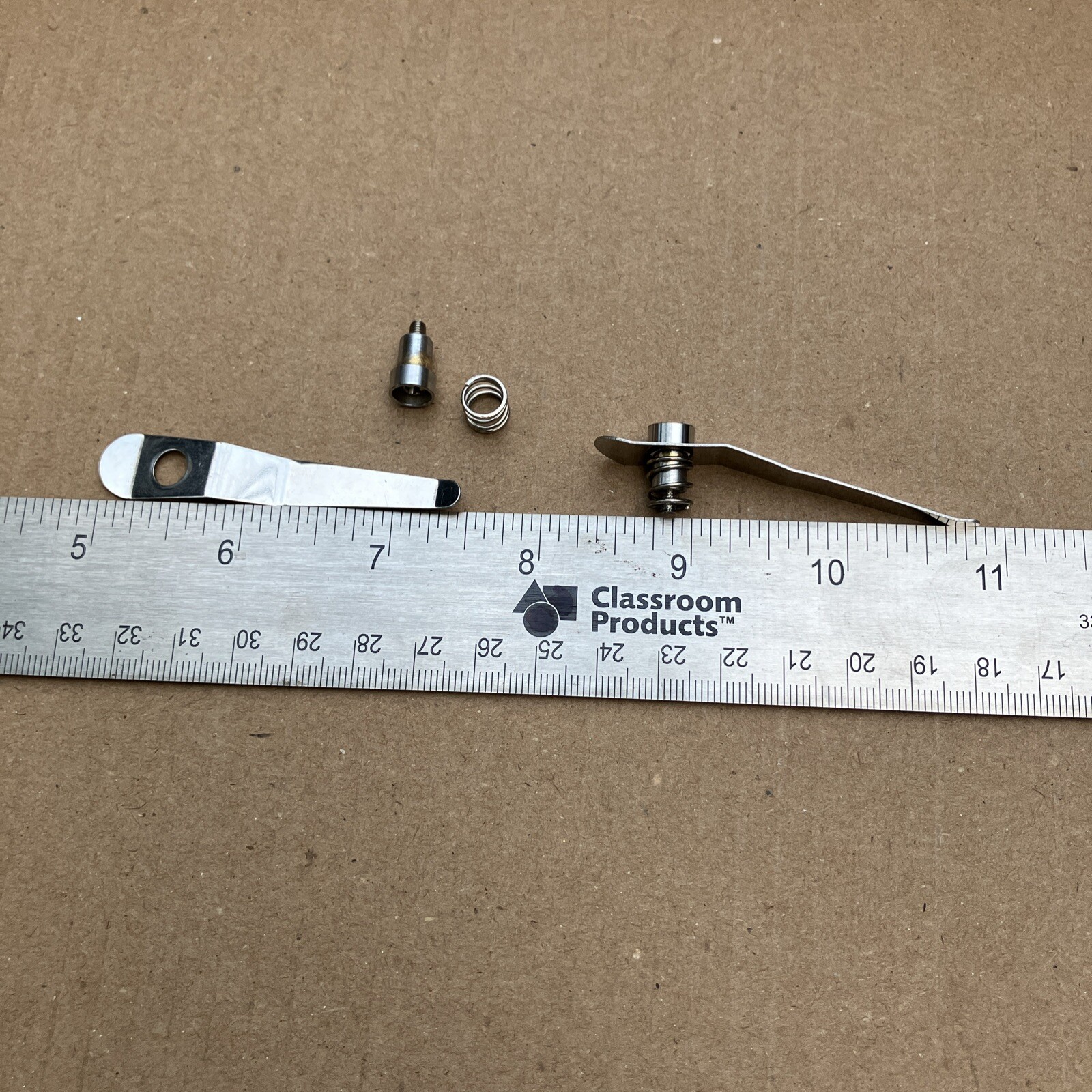 1 pair of microscope stage clips Unknown Brand