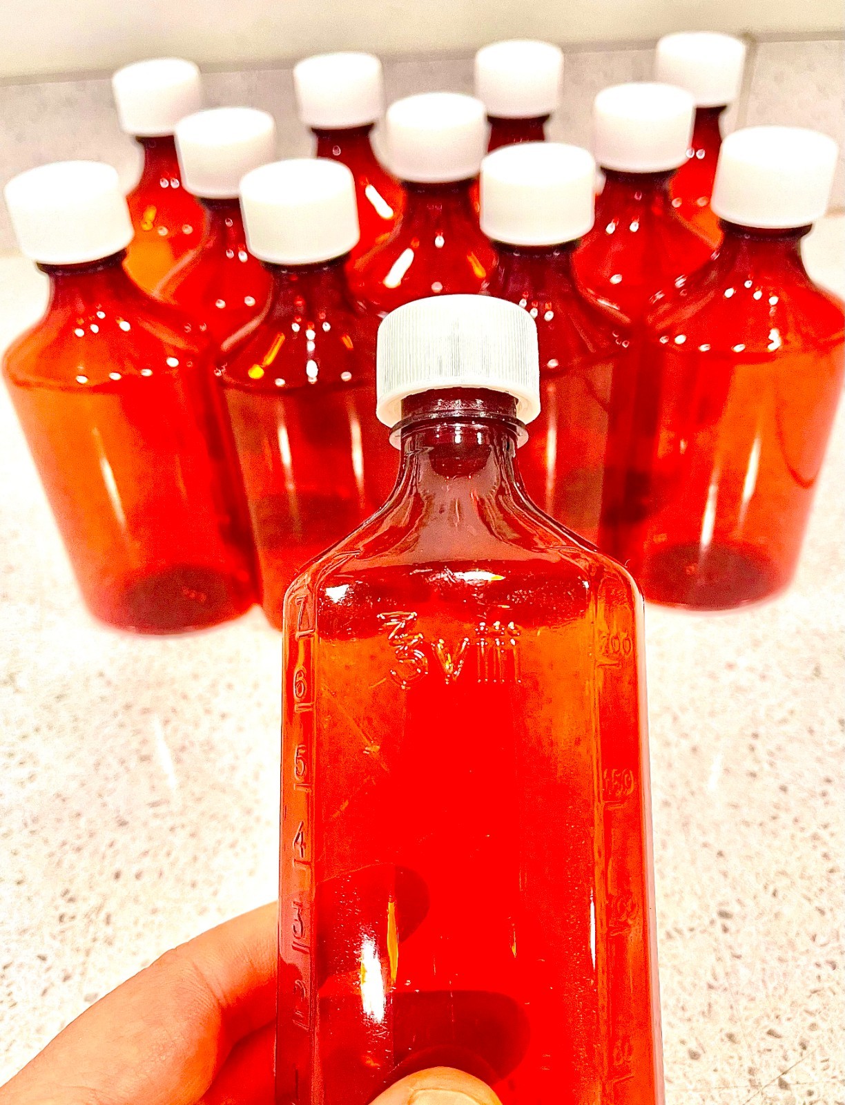 Amber Graduated Oval Liquid Medicine Bottle, Plastic w/ CR Caps 8OUNCE