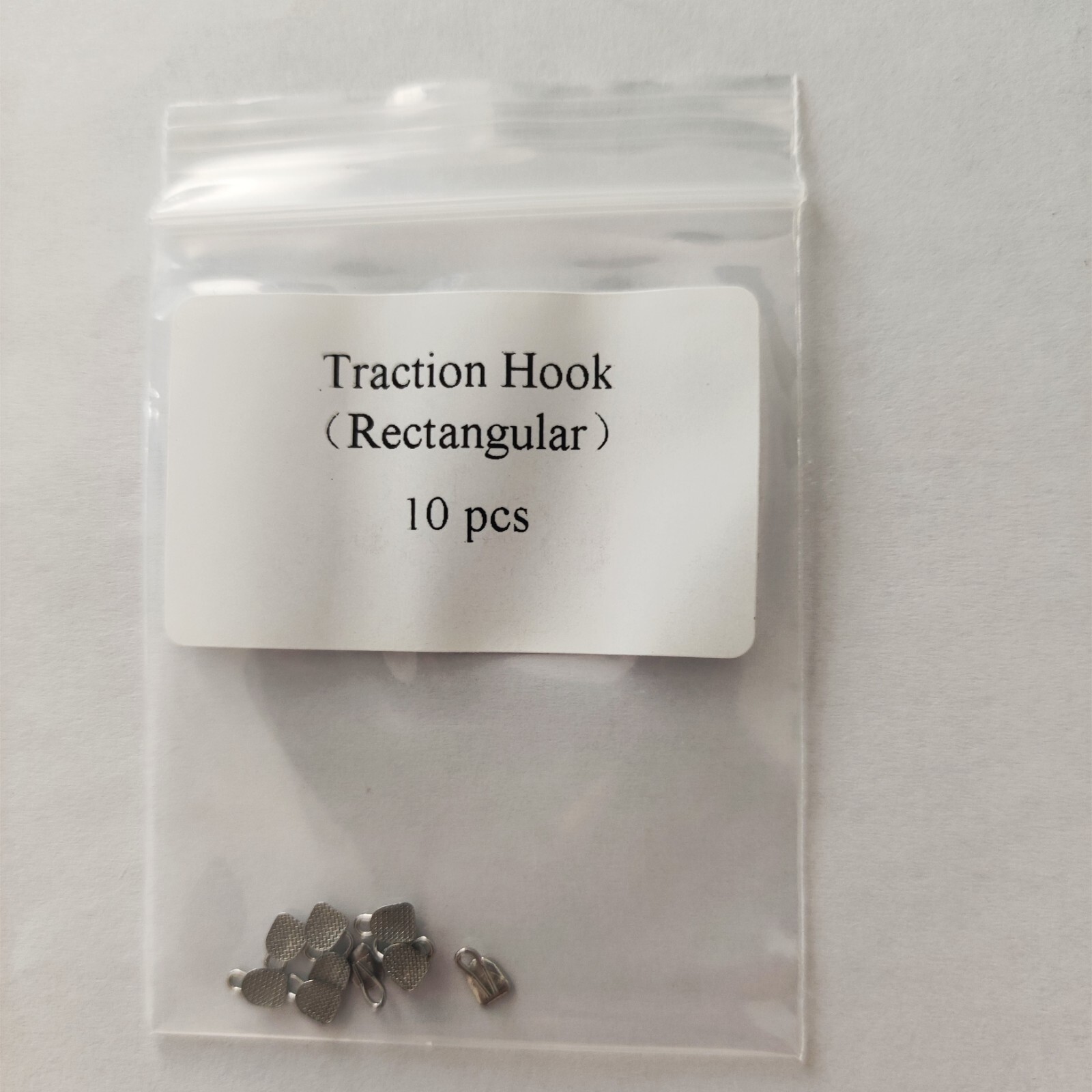 10 Packs 100pcs Dental Lingual Buttons With Traction Hook Rectangular Base