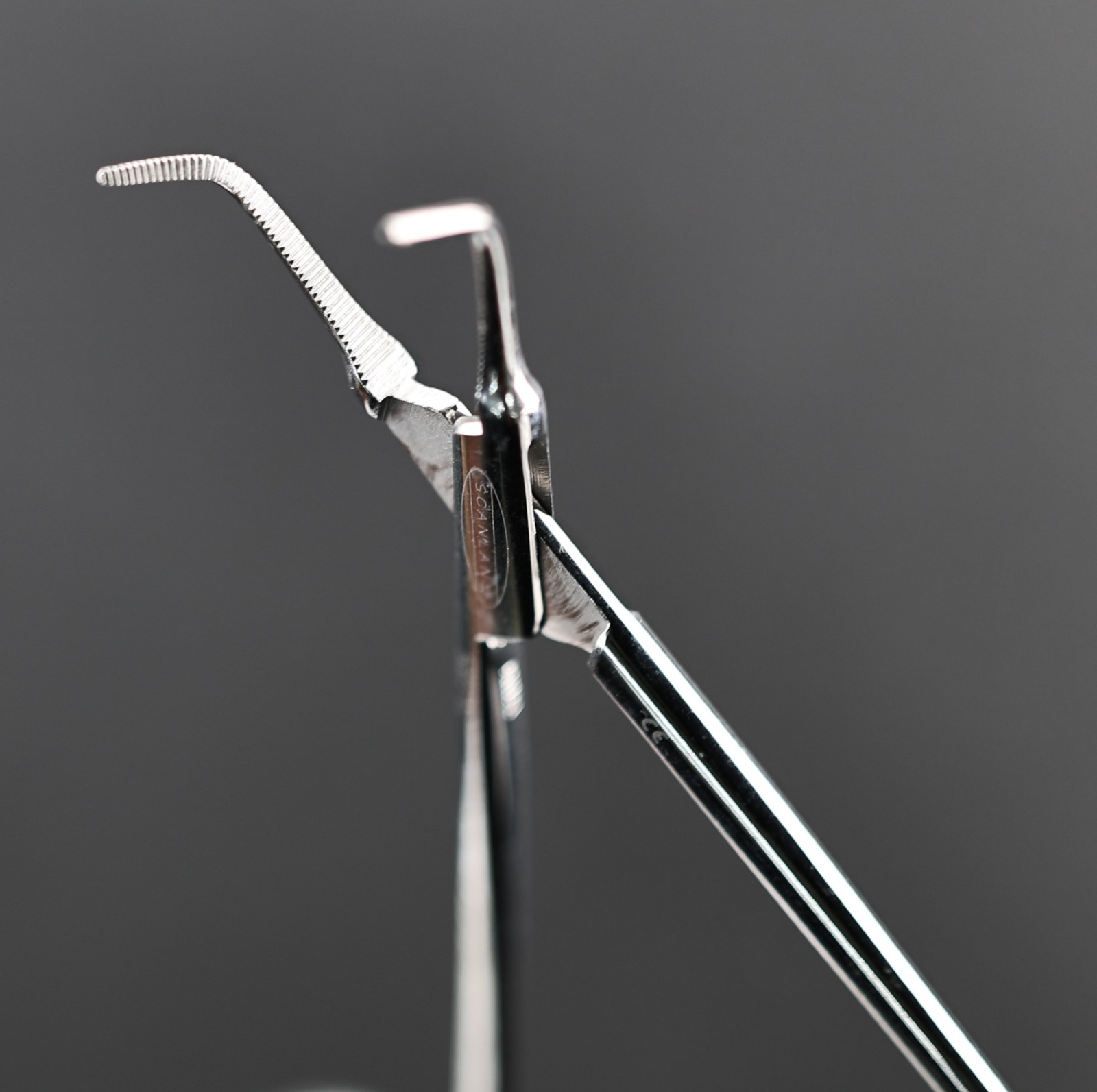 Scanlan 5005-62 Bailey Forceps, Serrated, Delicate, Angled 60°, 7″