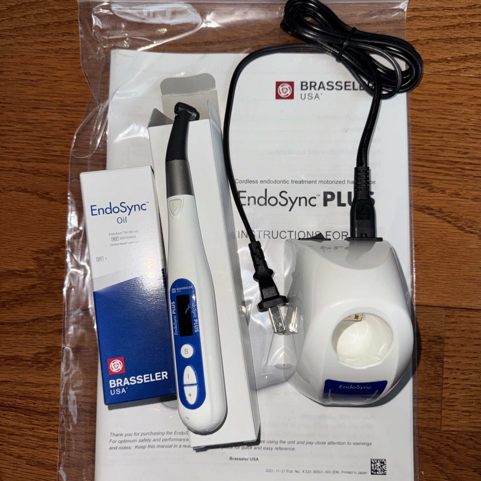 EndoSync Plus Cordless Endodontic MicroMotor. Charger And Oil Included.