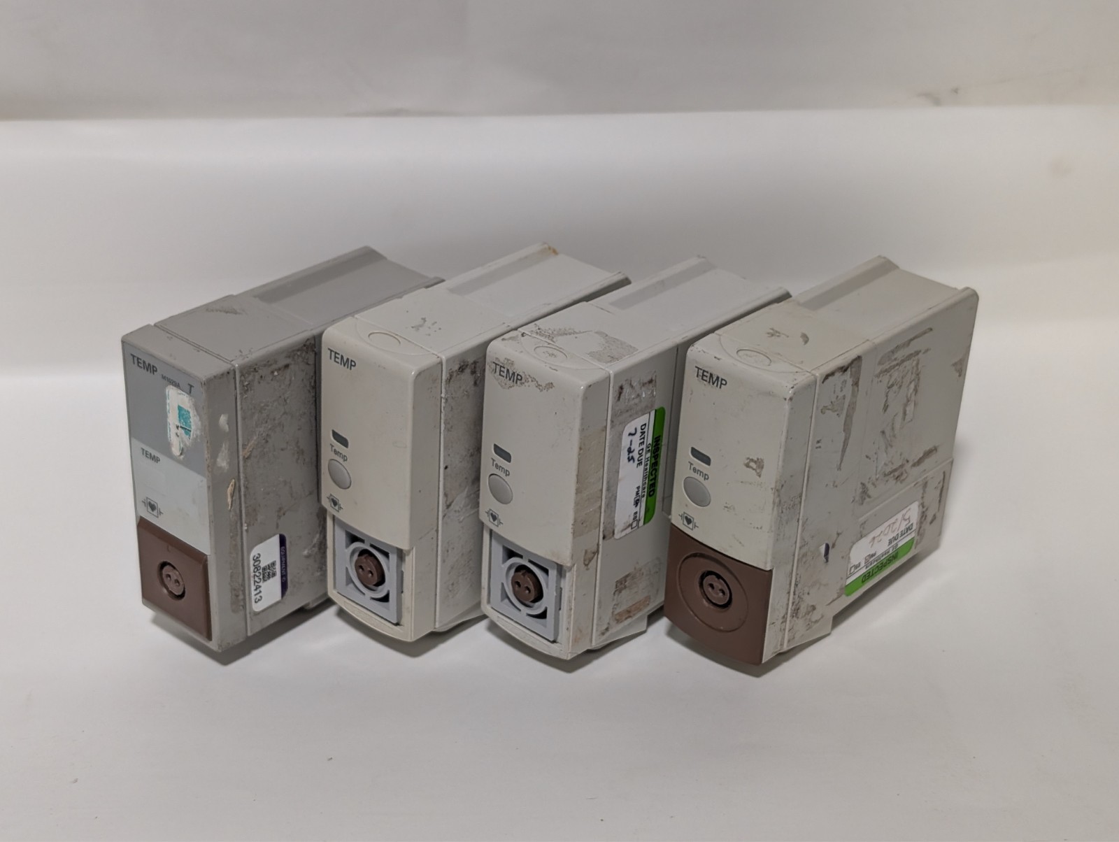 Lot of 4 Philips HP M1029A Temperature modules for patient monitors, as shown